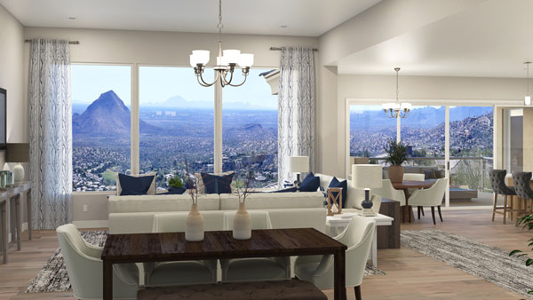 1B-Great-Room.600 The interior of a home with a view of the living room and a scenic view out the windows.