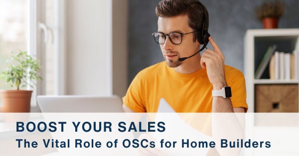 online-sales-counselor-600×314 Man in an orange shirt talking to a client on a headset and working on his laptop